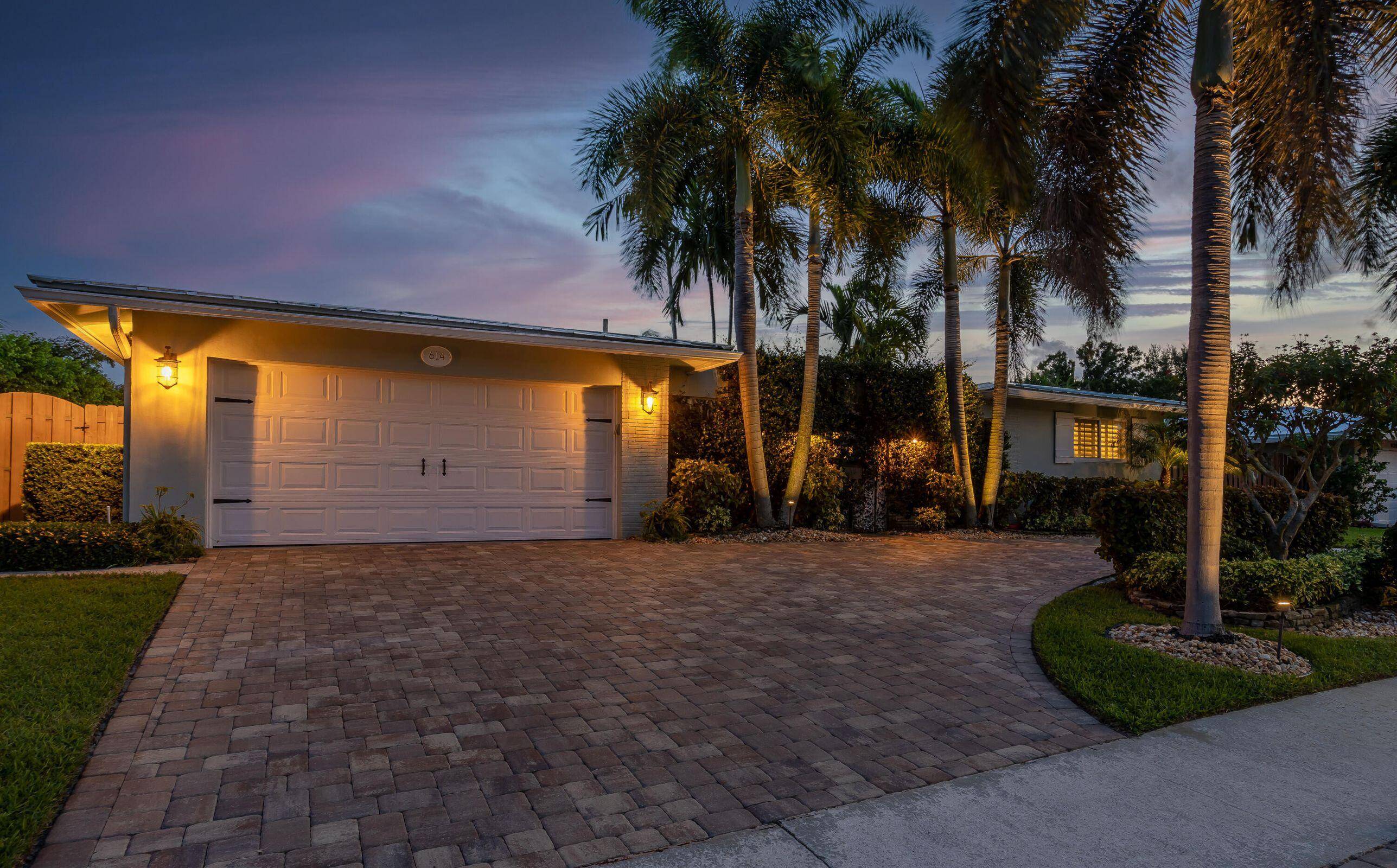 Experience the height of style and comfort in this beautifully updated, one level home with a serene poolside retreat !