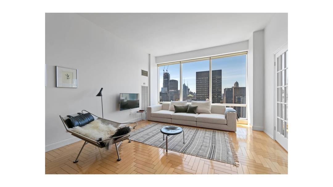 Spectacular City Skyline and River Views Perched on the 53rd floor of 845 United Nations Plaza, this expansive luxurious corner 2 bedroom, 2 bath residence showcases sweeping northwestern exposures with ...