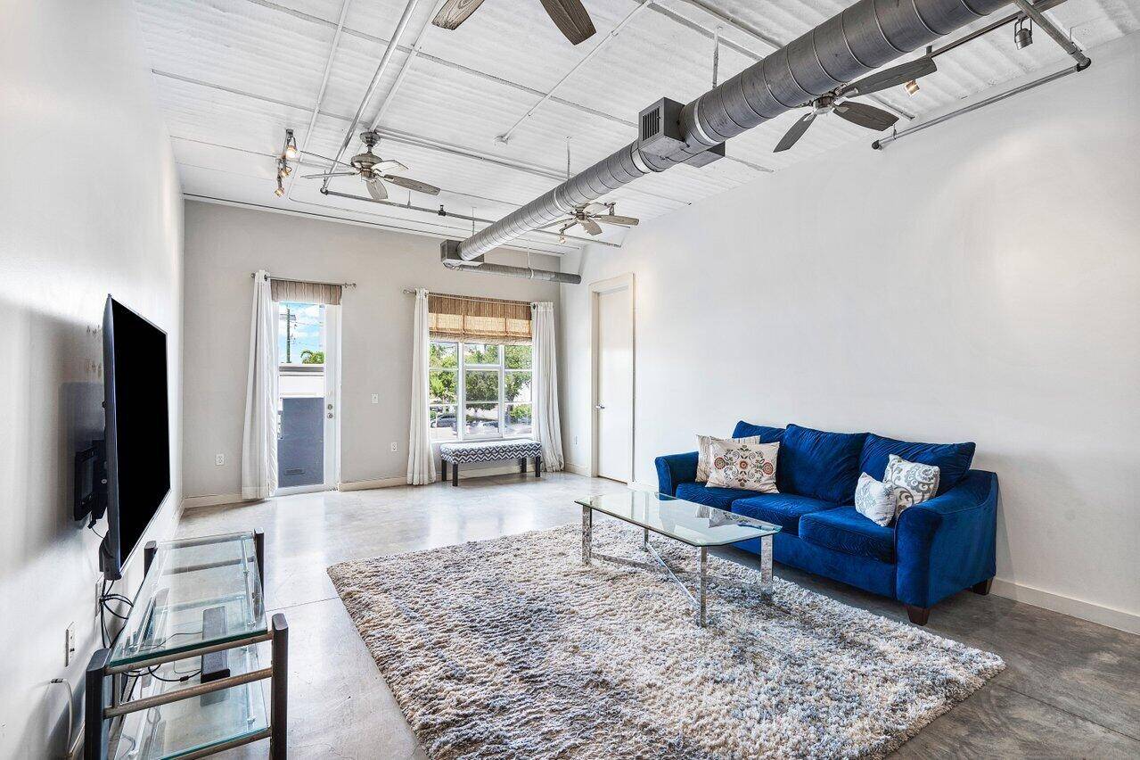 Discover urban elegance at 103 SE 4th St, nestled in the vibrant heart of downtown Delray.