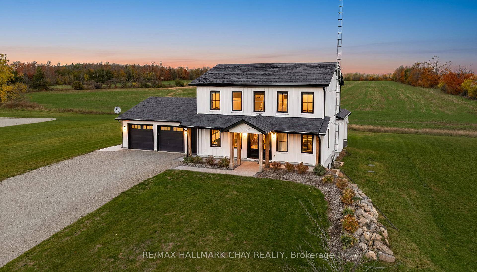 Nestled on 2 private acres, this stunning two year old custom built modern farmhouse offers 2, 800 sq.