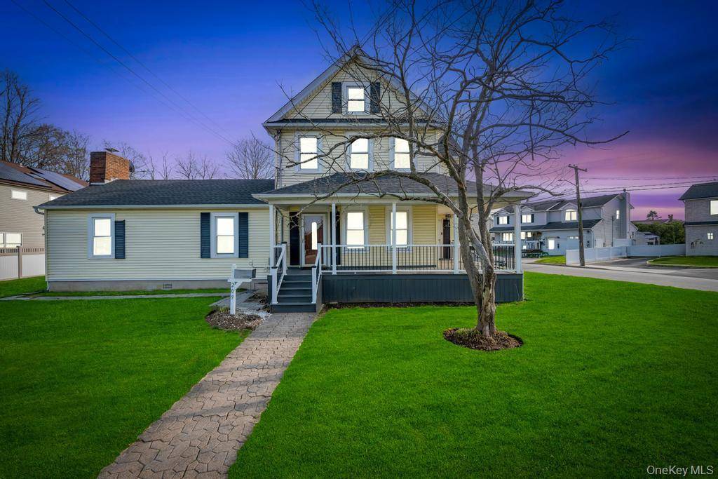 Spacious Colonial home set on an oversized lot in Bethpage, featuring 5 bedrooms and 3 full baths.