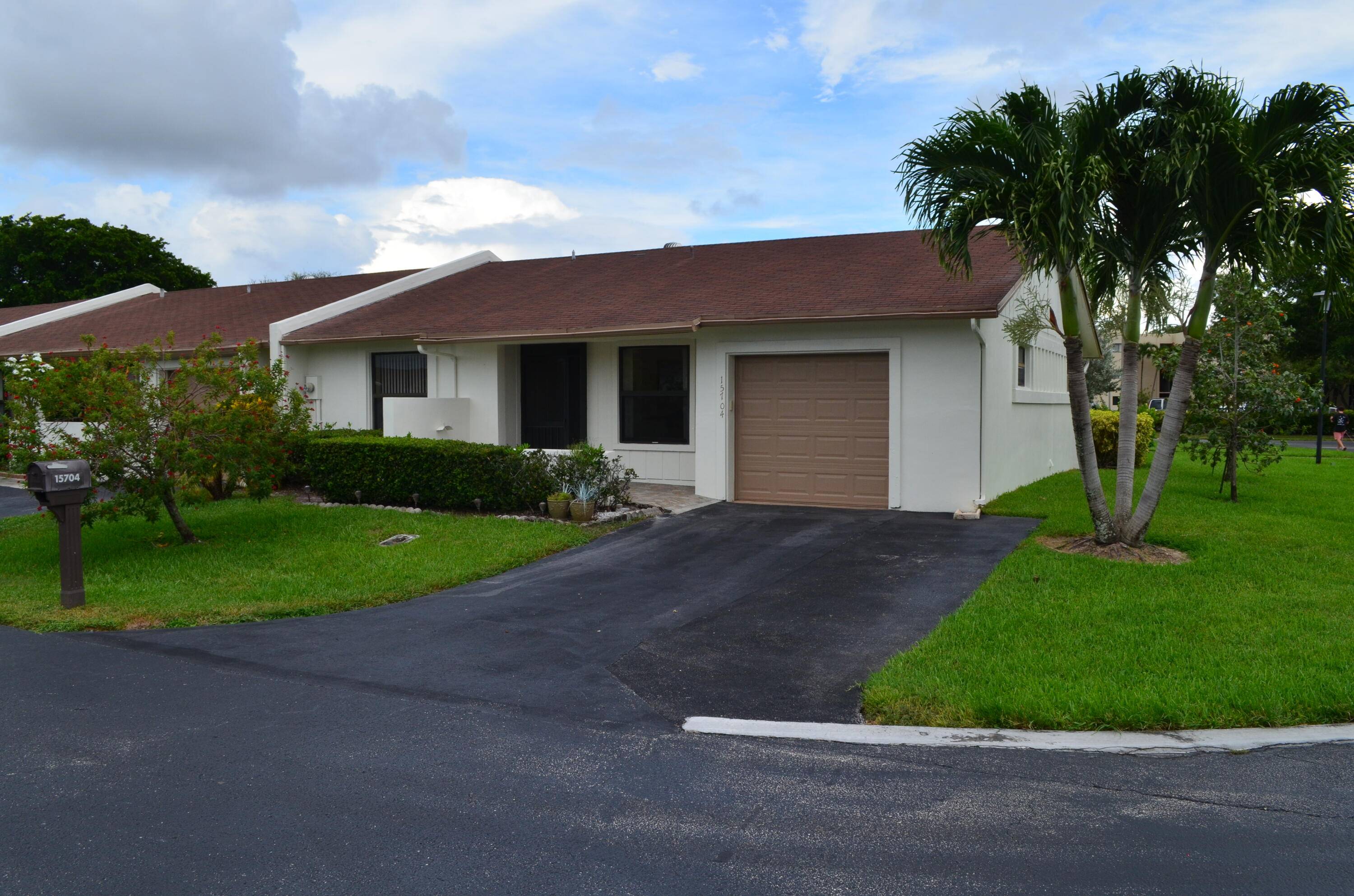 Absolutely stunning 2 2 End Unit Villa completely remodeled w gorgeous open kitchen, level finished family room newer bathrooms w Walk In Showers in both.