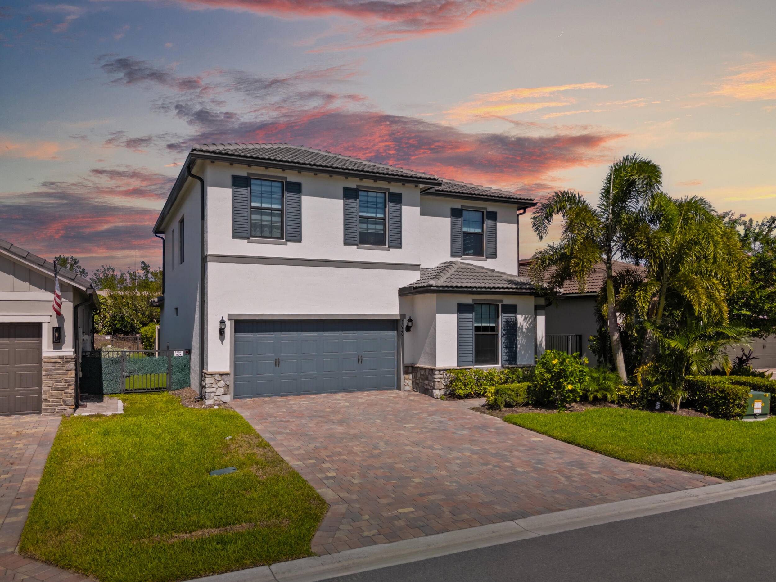 Located in the highly desirable gated community of The Fields, this beautifully customized two story residence combines modern luxury with thoughtful design.