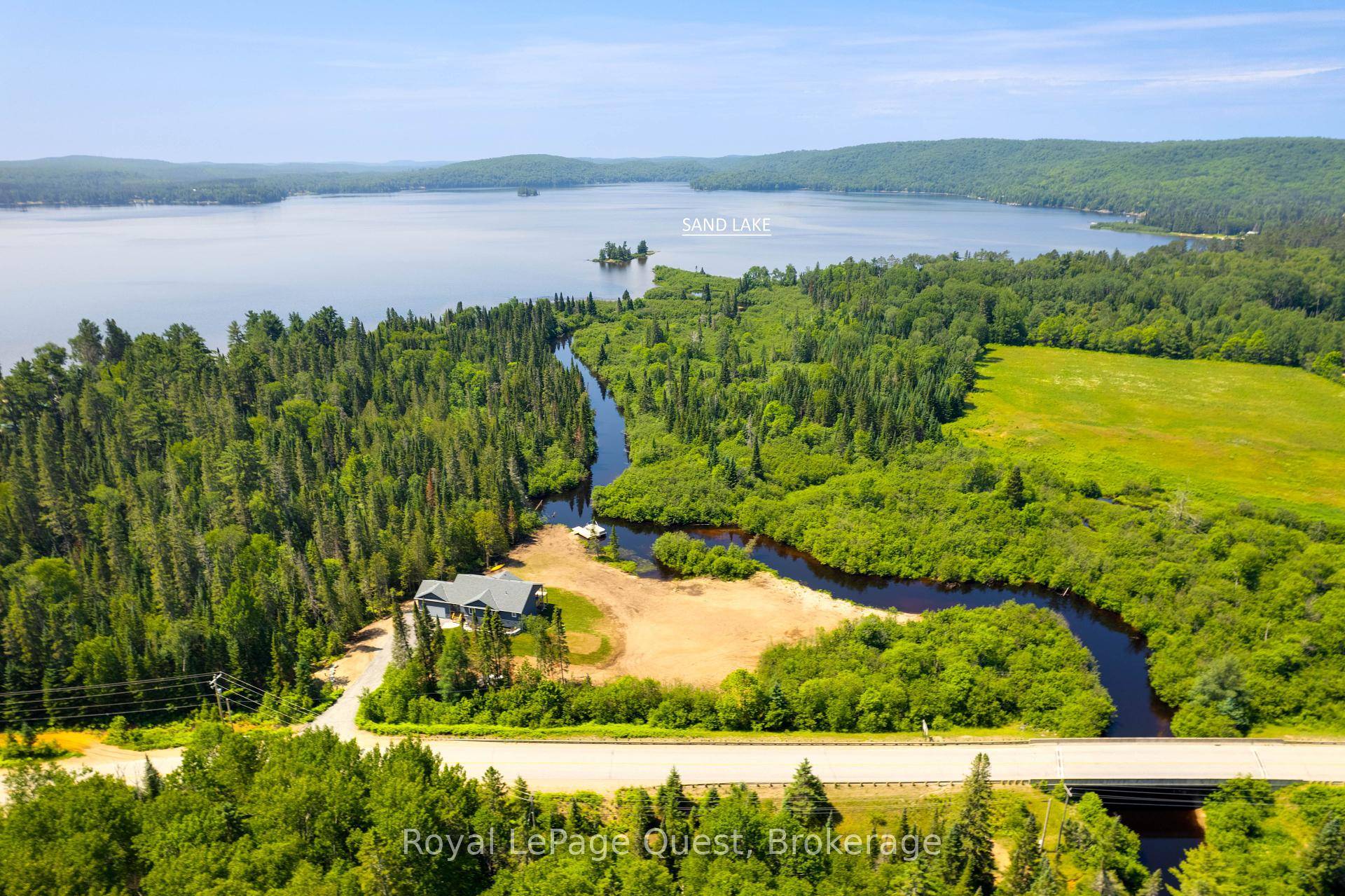 Welcome to this peaceful retreat on close to 2 acres amp ; picturesque riverfront property.