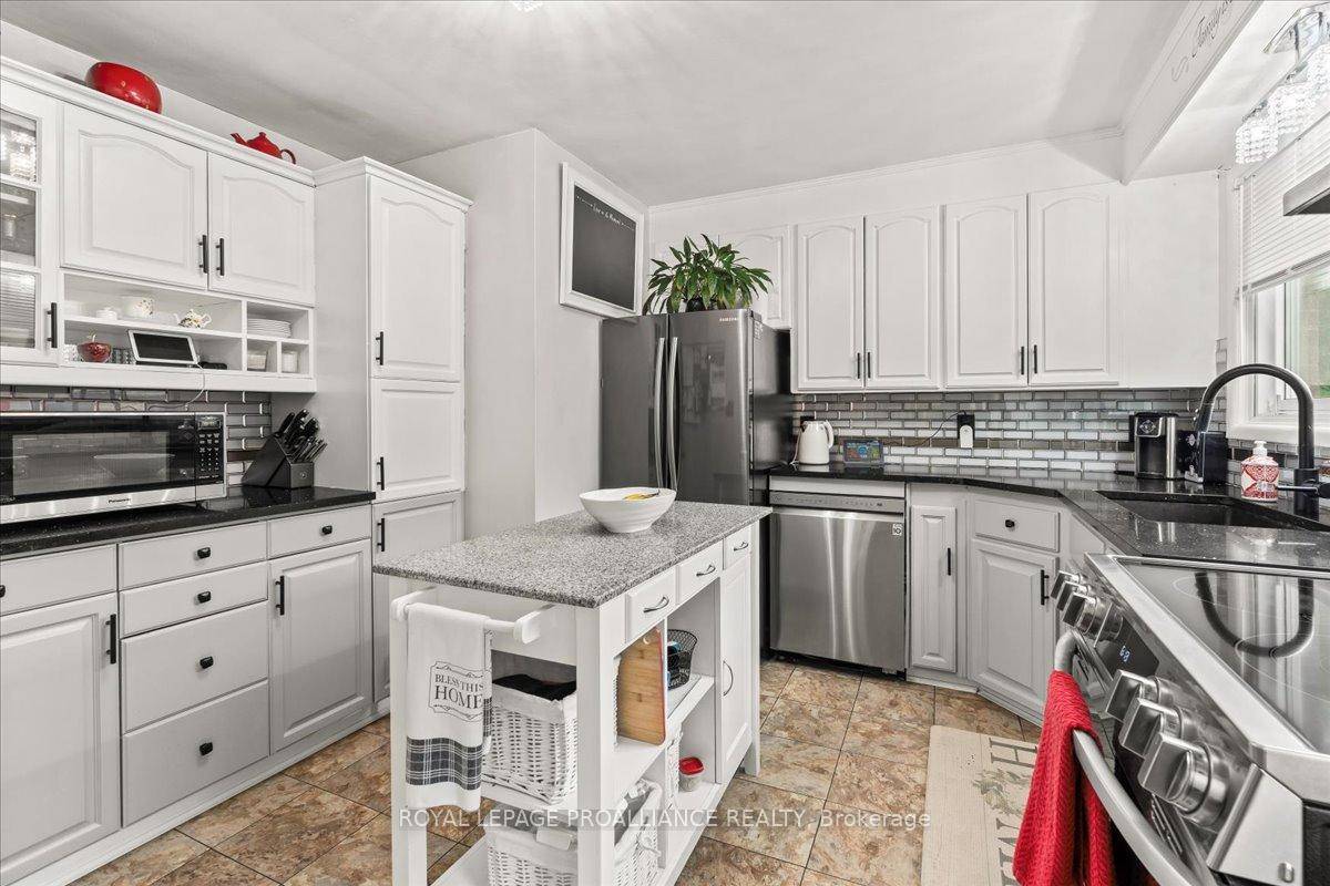 Welcome home ! This well maintained 3 bedroom, 2 bathroom all brick home offers modern updates and unbeatable convenience !
