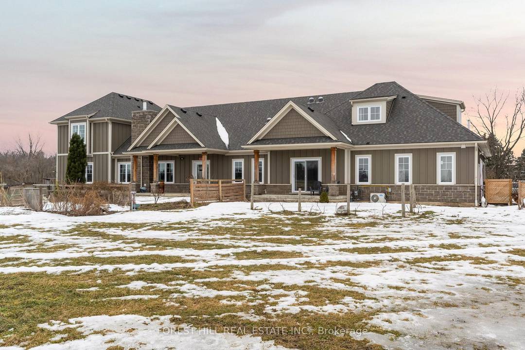 Stunning 6 bedroom, 4 bathroom home, built just five years ago, offers modern luxury on approximately 54 acres, including over 20 acres of beautifully planted, picturesque vineyard.