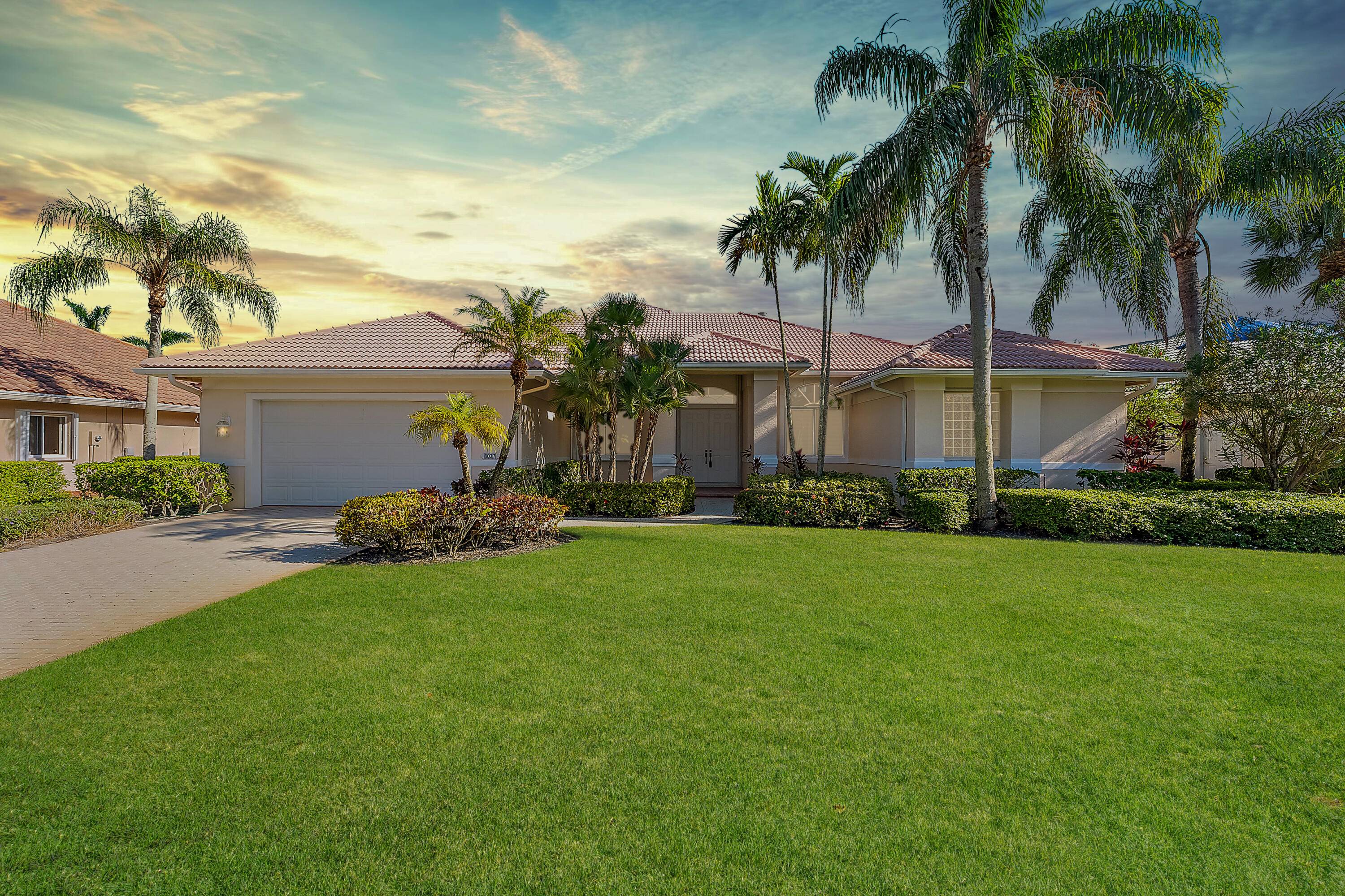 Nestled within the prestigious gated community of The Falls at Lost Lake just minutes from Hobe Sound Beach and Jupiter Island.