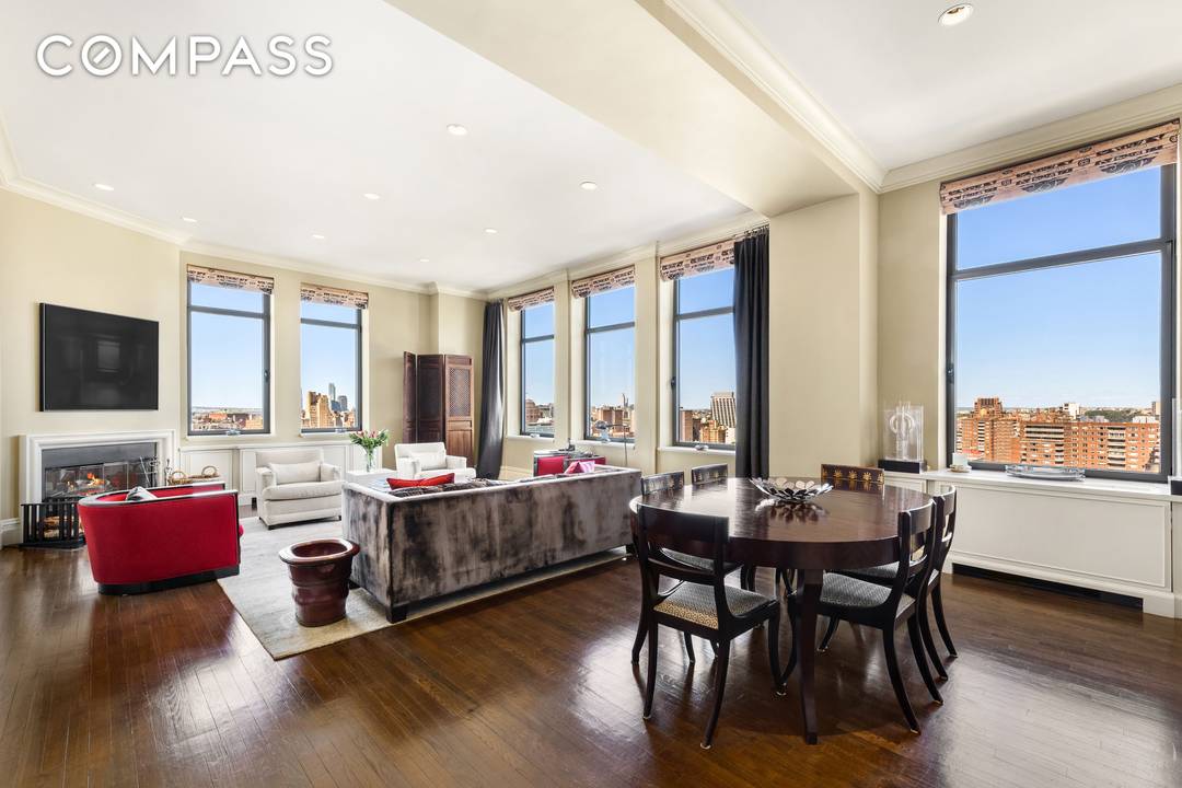 This duplex penthouse residence feels like a townhouse in the sky, with a gracious entry hall leading to the living dining space, kitchen and two bedrooms on the first floor.