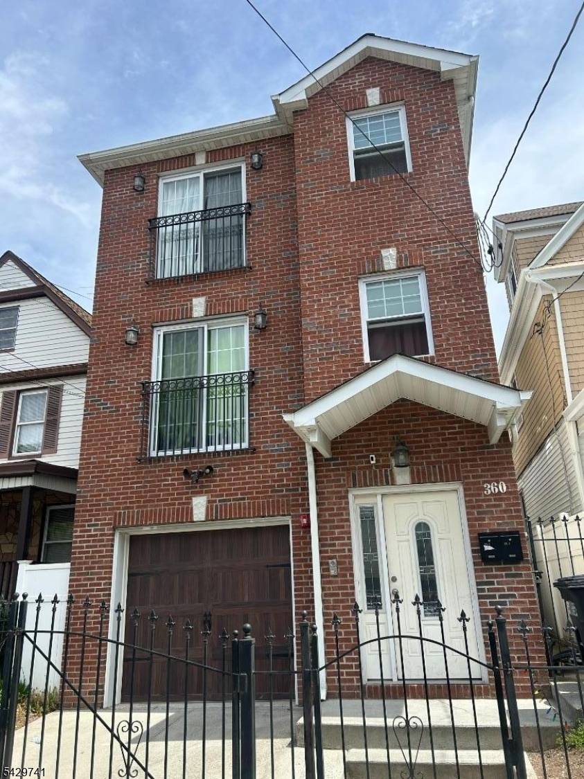 Crafted from durable brick and vinyl siding, this detached gem promises low maintenance and long term value.