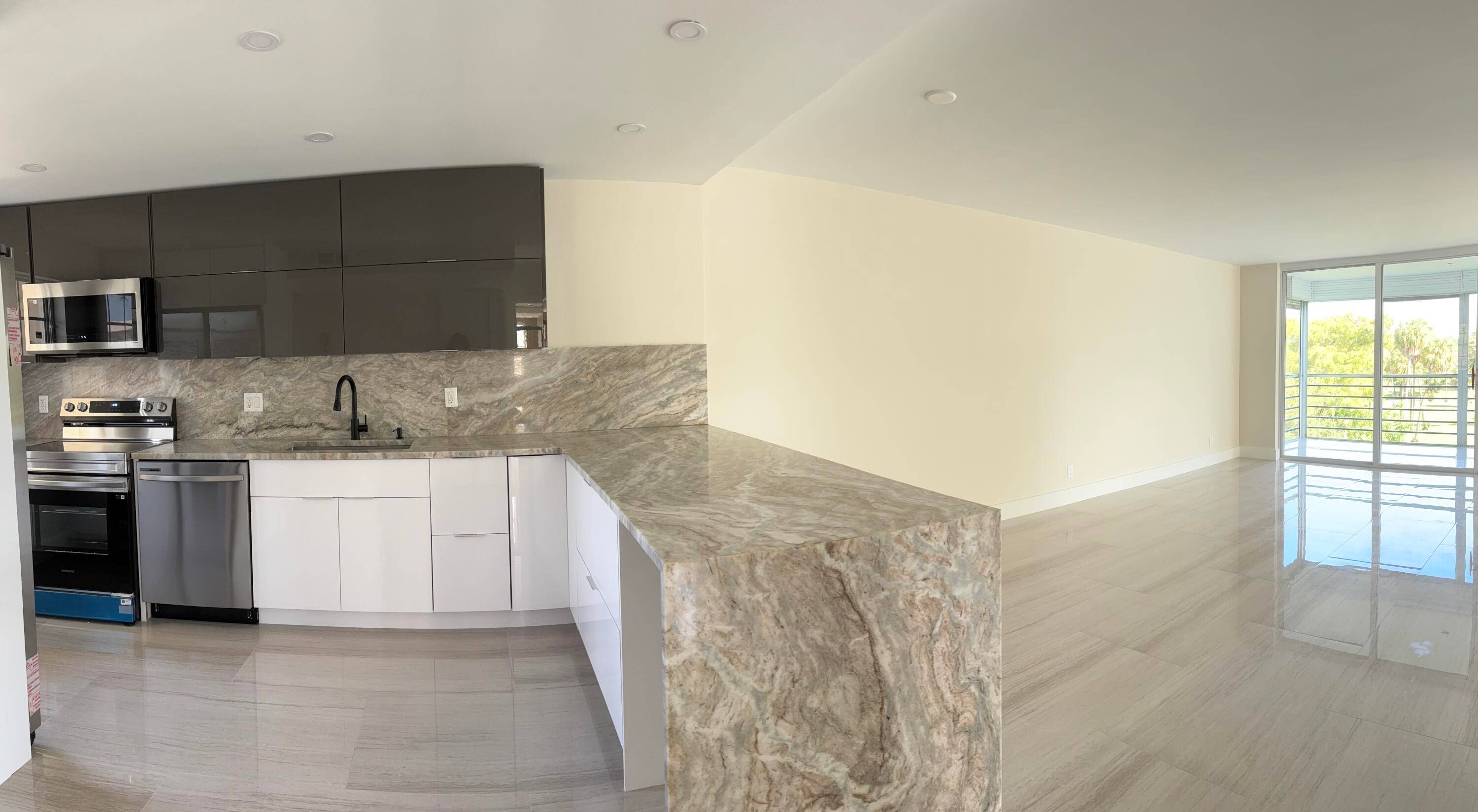 Fully remodeled corner unit 3BR 2BA condo with windows in every room, filling the home with natural light and sweeping golf landscape views !