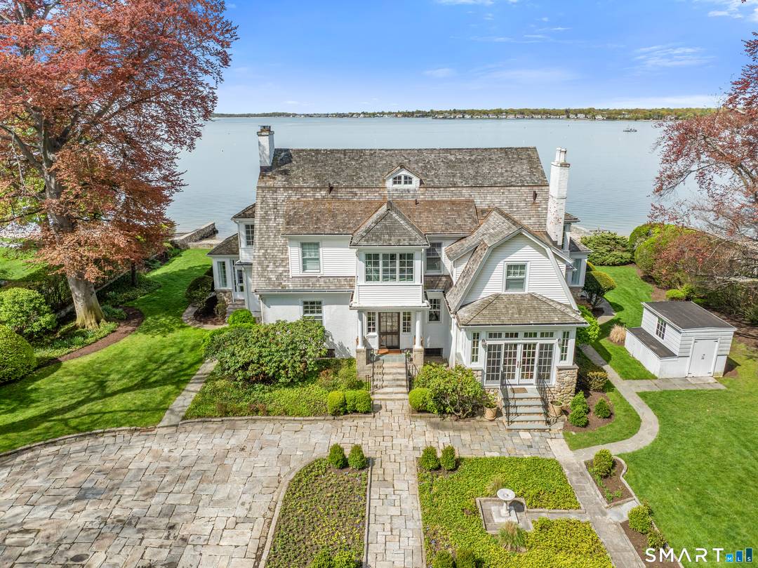Set on 150 feet of private sandy beach along Stamford Harbor, this exceptional Shippan Point waterfront offers a rare combination of direct sandy beachfront, striking views, and an exceptional position ...