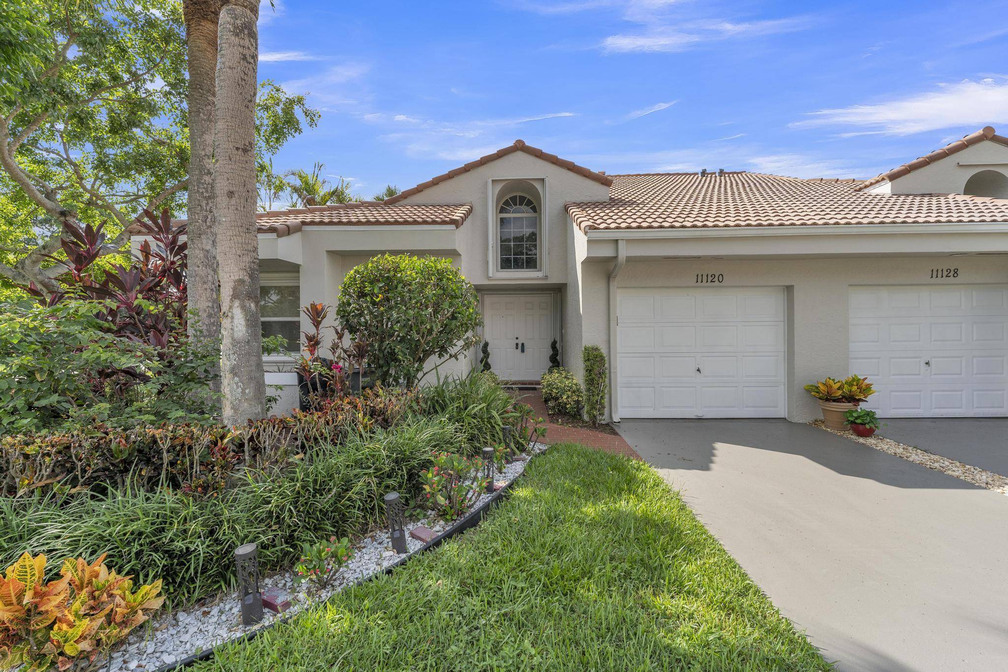 Beautifully updated and turnkey 2 bedroom, 2 bathroom villa with a 1 car garage and stunning lake view.