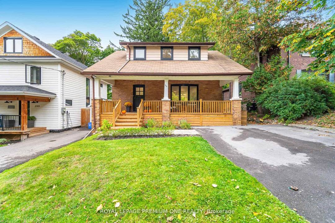 Welcome to this beautifully renovated century home that perfectly blends historic character with contemporary design.