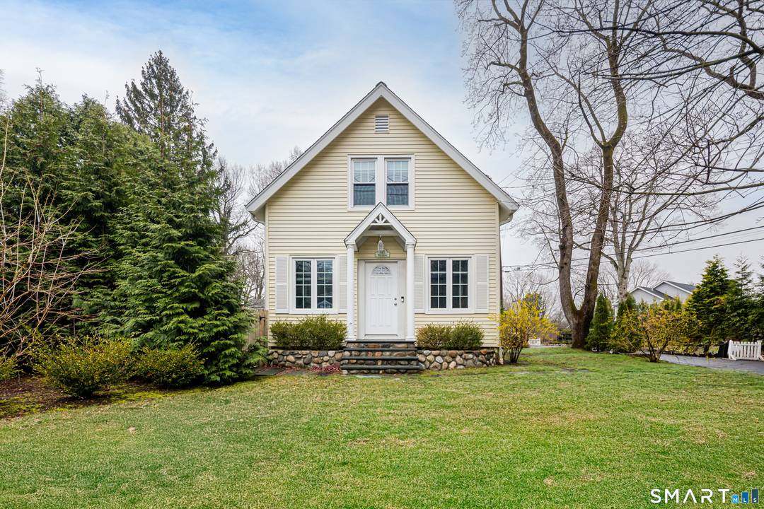 Fully renovated Colonial directly across the street from Woodland Park and.