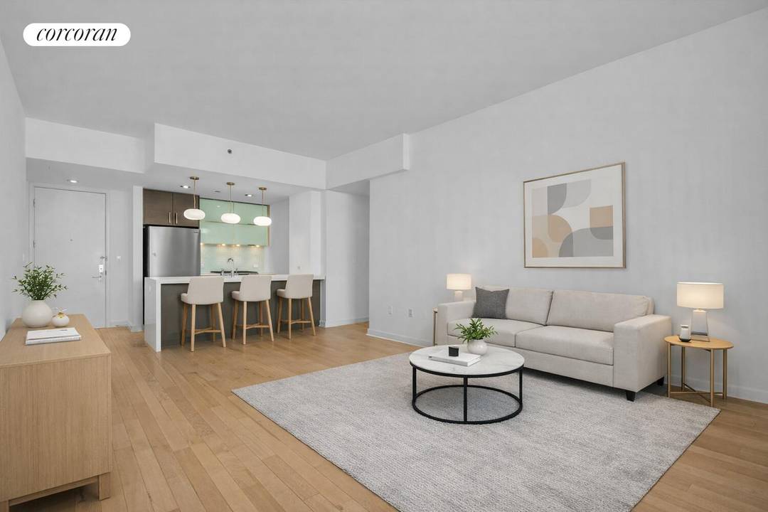 BRIGHT 723 SQ. FT. RESIDENCE WITH PRIVATE OUTDOOR SPACE AND OPEN CITY VIEWS.