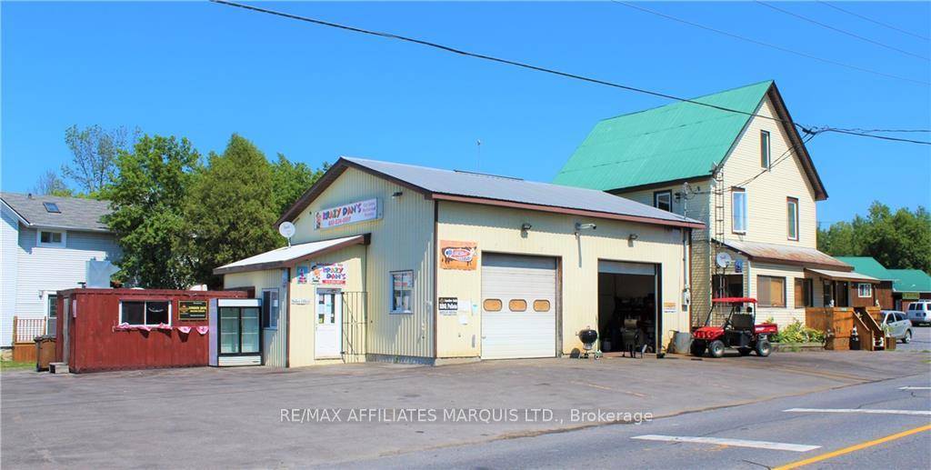 Presenting a unique Commercial opportunity to own a diversified business and residential DUPLEX property, featuring a garage shop, chip stand, and two rental units, all available for purchase at a ...