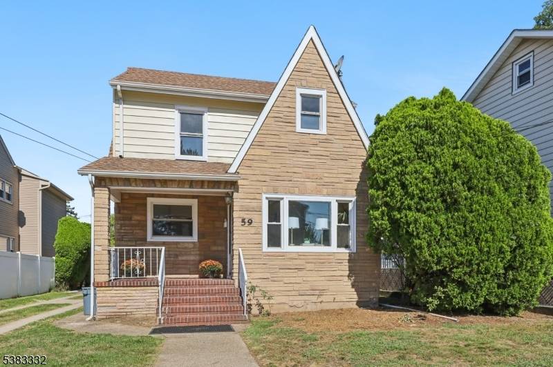Well maintained side hall colonial with one car garage, driveway good size yard.