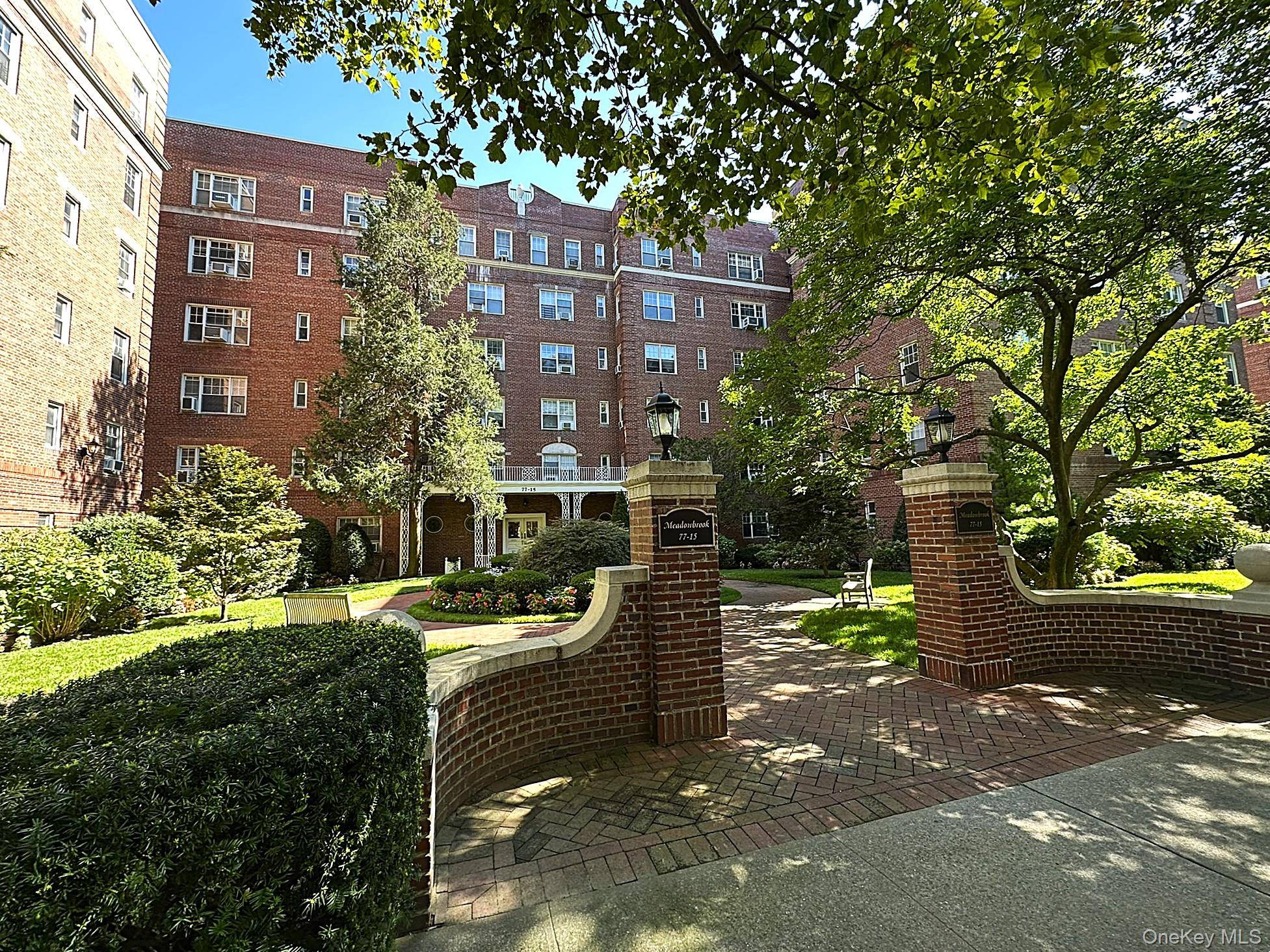A Gem in Forest Hills. Welcome to this rarely available corner apartment, a true gem within the highly sought after Forest Hills South community.