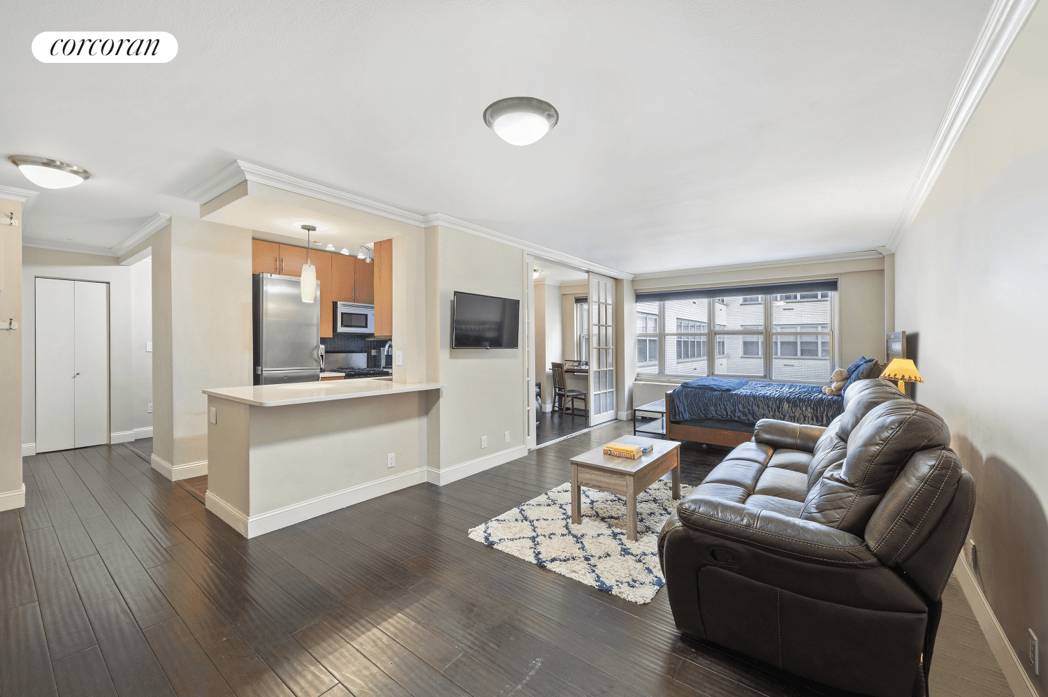 Experience the allure of this distinctive apartment, featuring a captivating floor plan that gracefully separates the dressing area and bath.