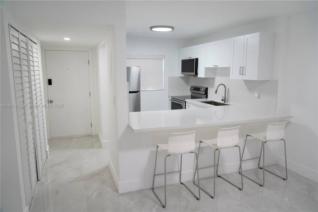 Excellent ground floor corner unit, Lake front with patio.