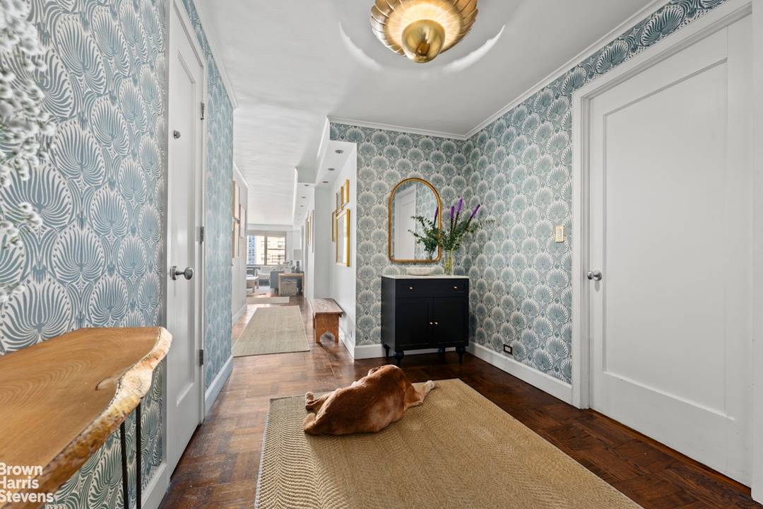 Experience the pinnacle of Upper East Side living in this meticulously combined and renovated 3 bedroom residence.