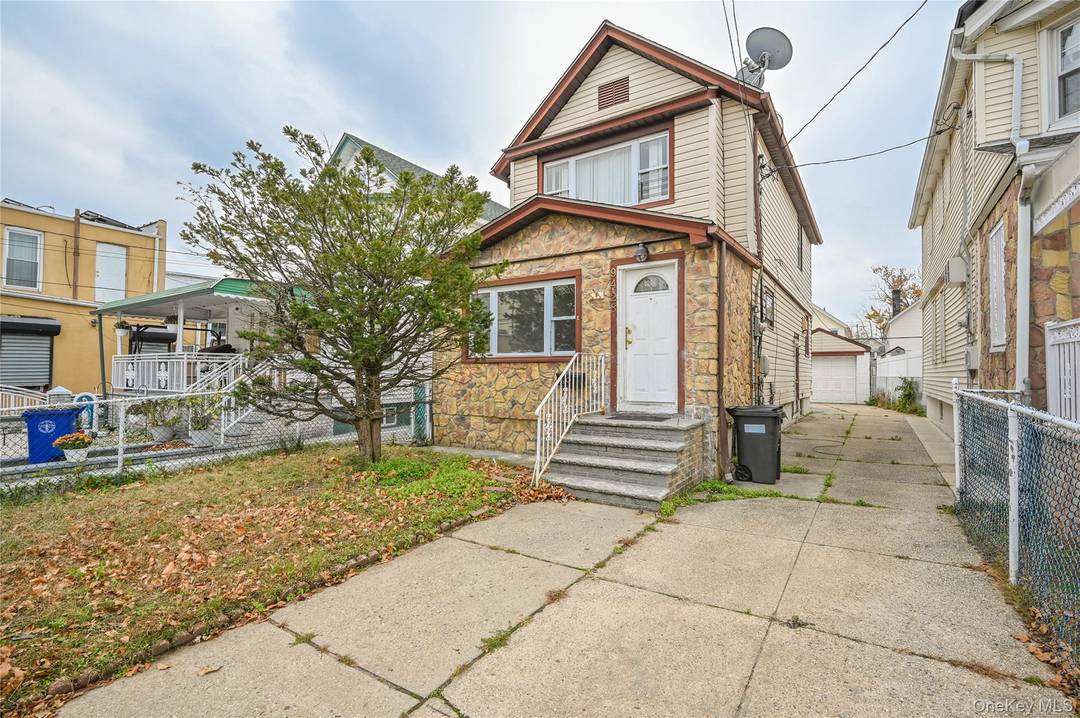 Opportunity knocks with this detached 3 bedroom, 1 bath Colonial perfectly located near the subway, buses, and shopping.