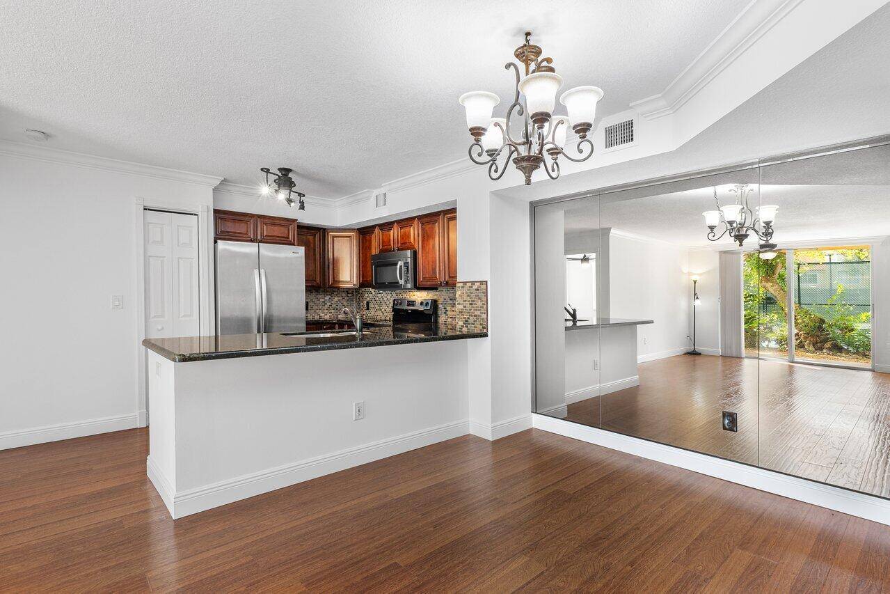 Major price reduction ! Welcome to the Yacht Club on the Intracoastal, a gated, private community that sits on 23 acres of Lush tropical landscape, located directly on the Intracoastal.