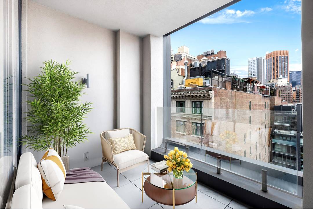 This one bedroom, one and a half bath residence boasts impressive 10'6 ceilings, expansive northern facing windows, and a private terrace.