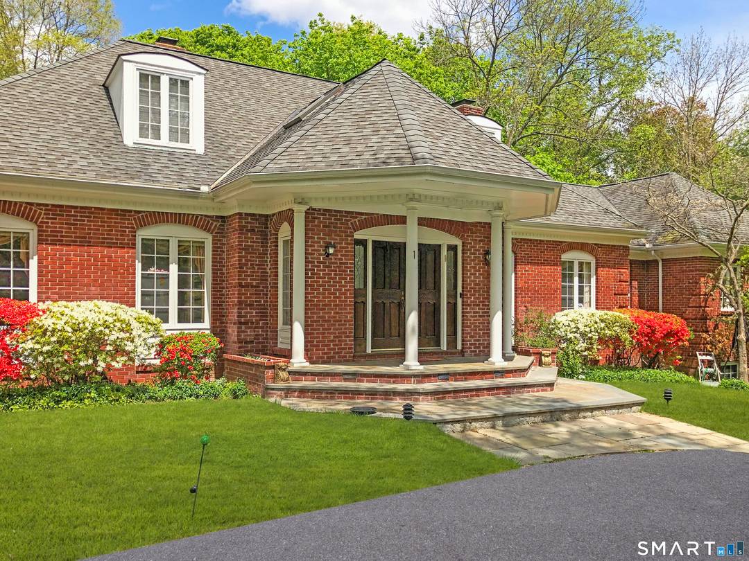 Privacy, luxury, and effortless indoor outdoor living define this striking residence, tucked away on a private road.