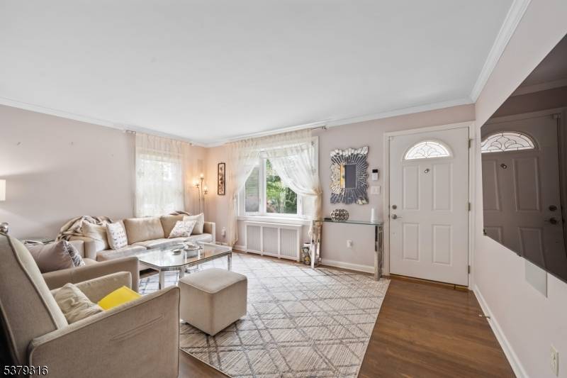 Tucked away on a quiet, private street, this beautifully expanded Cape offers space, comfort, and unbeatable convenience just minutes from NYC transportation, major highways, top rated schools, local shops, and ...