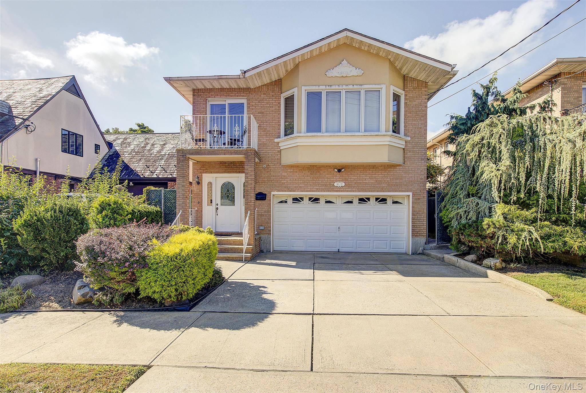 Welcome to this stunning custom built Hi Ranch in prime Beechhurst, designed with a versatile mother daughter layout perfect for multi generational living.