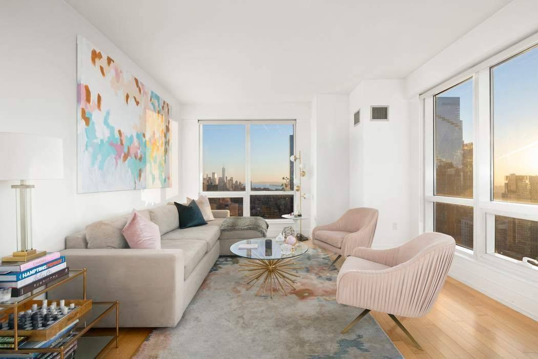 Welcome to Unit 44H, a beautiful corner unit at the sought after Orion Condominium.