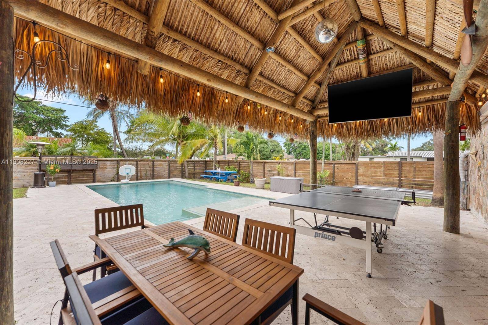 Stunning pool home on a large corner lot in the highly sought after Hollywood Hills neighborhood.