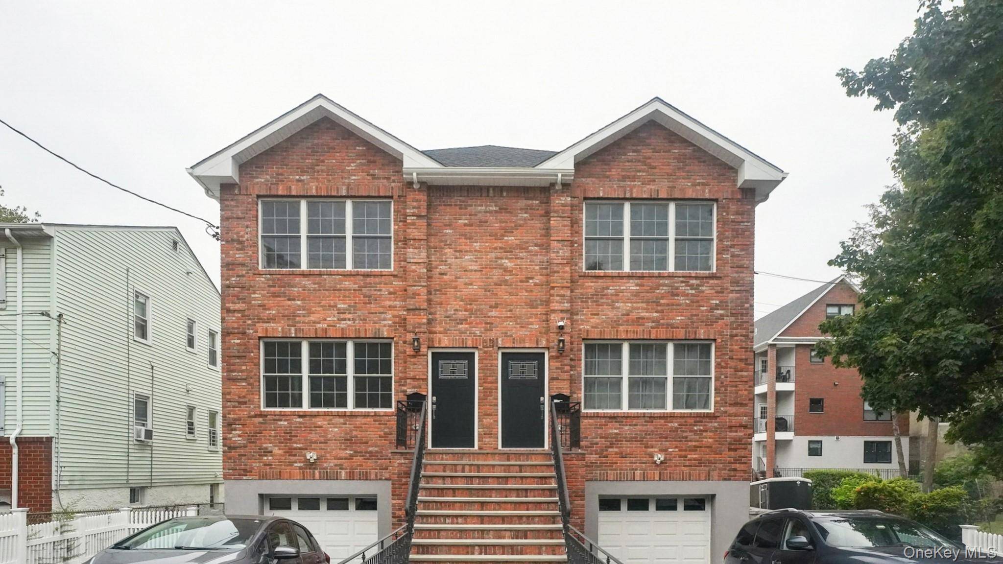 Beautifully built brick residence featuring 3 spacious bedrooms including a primary suite with en suite bath, an additional full bath, and a convenient half bath on the first floor.