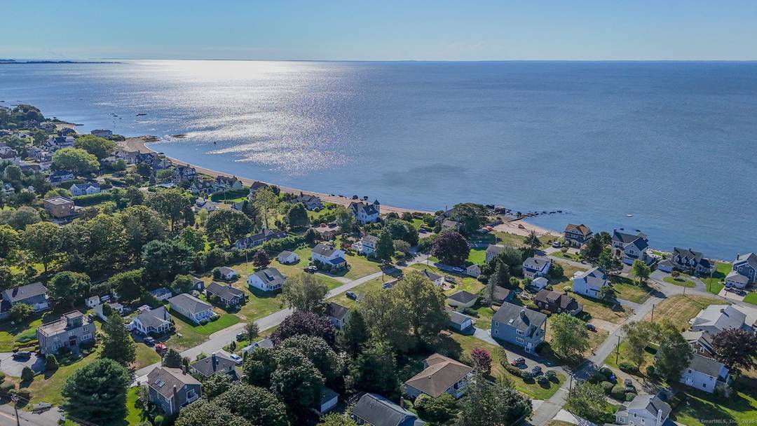 COME SEE THIS ONE OF KIND FULLY RENOVATED MADISON HOME WITH PRIVATE BEACH RIGHTS !