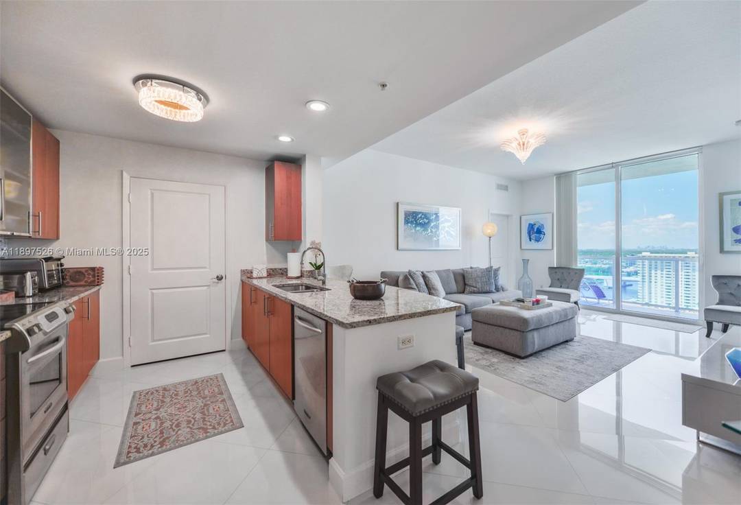 Elegant 2 bedroom, 2. 5 bath residence at Ocean Marine Yacht Club in Hallandale Beach, offered furnished with marble floors throughout.
