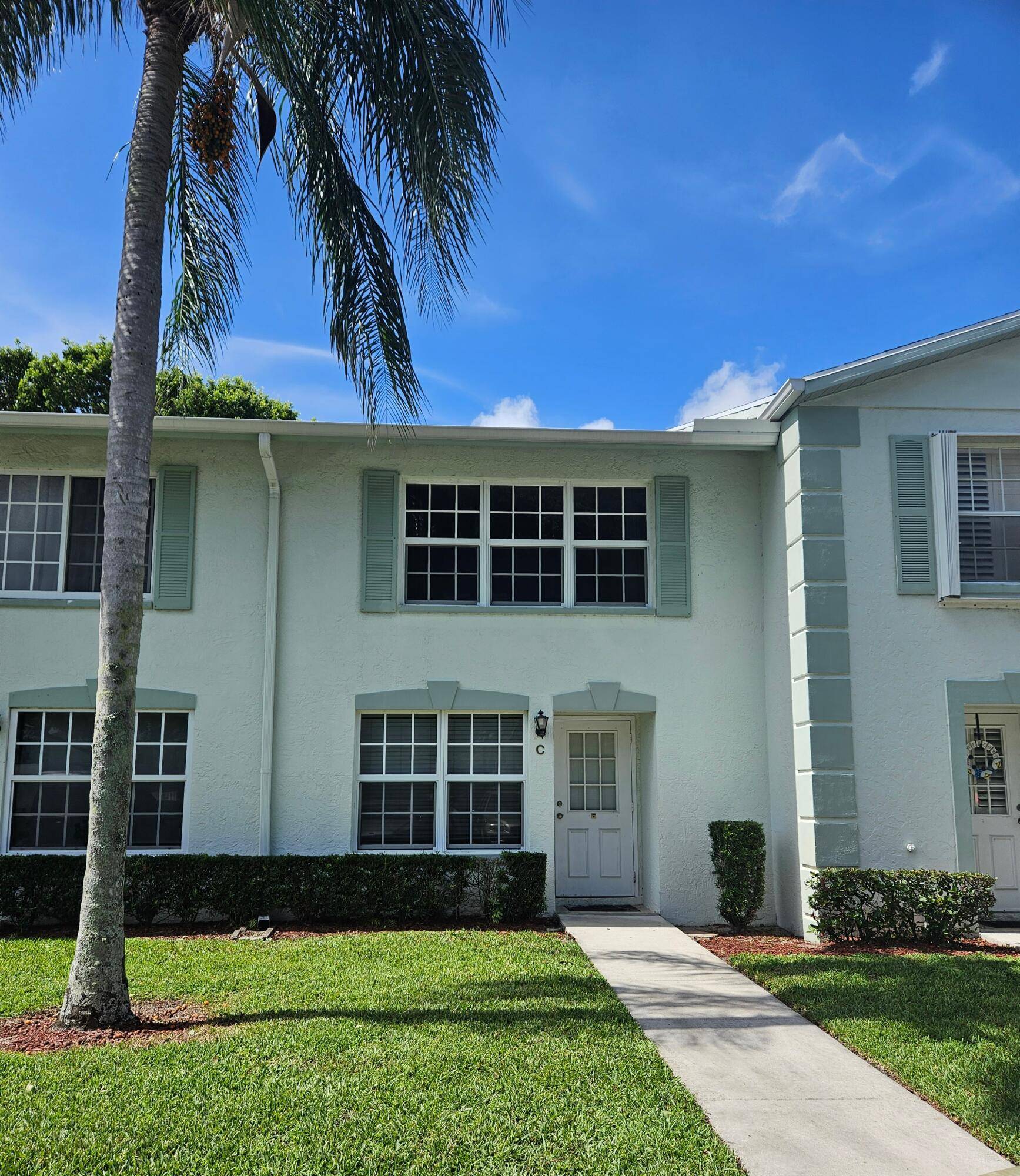 3 bedroom 2. 5 bath beautiful Palm Club West Townhouse on canal.