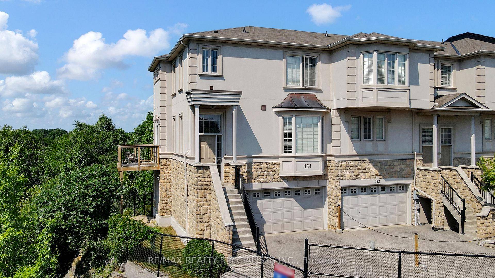 Executive End Unit Town home with Stunning Green space Views in Stoneridge Estates !