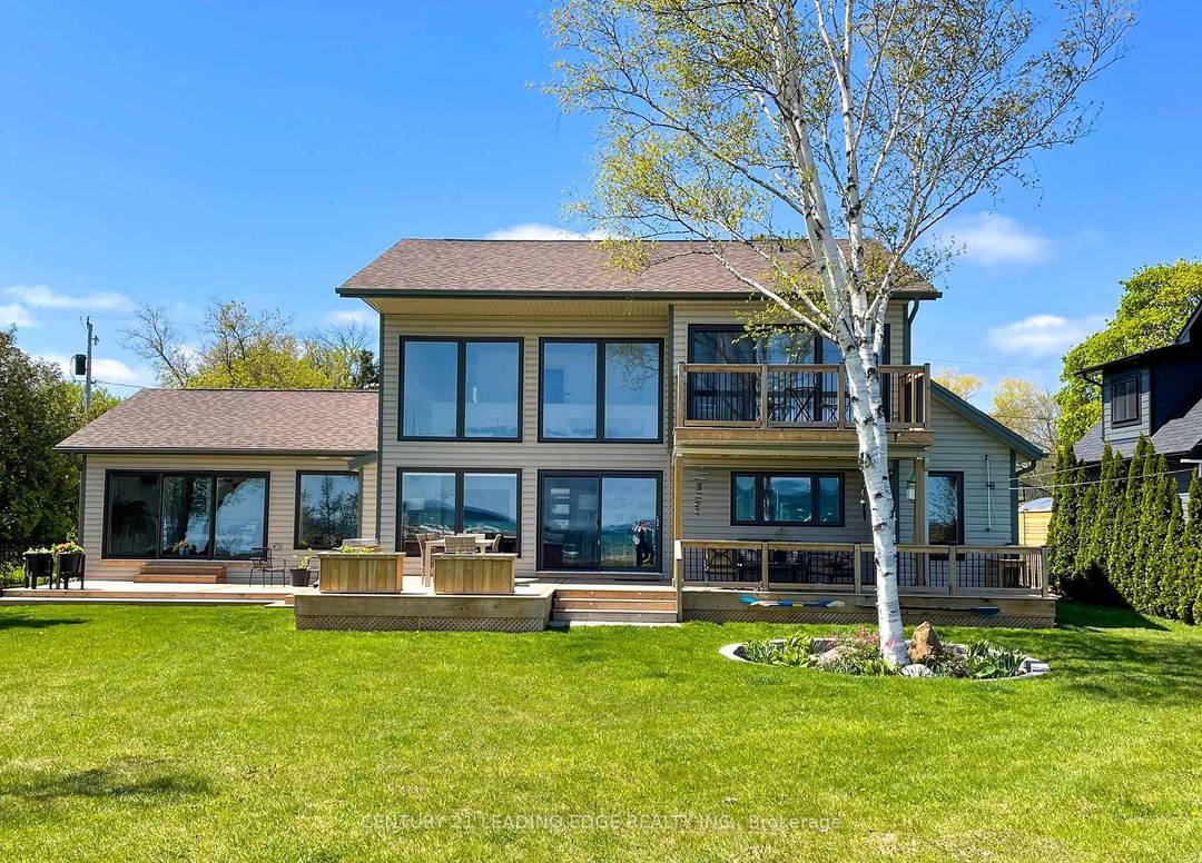 Welcome to The Lake House a bright amp ; airy 5 bedroom lakeside retreat on the stunning shores of Georgian Bay, with a separate 1 bdrm Coach House, available for ...