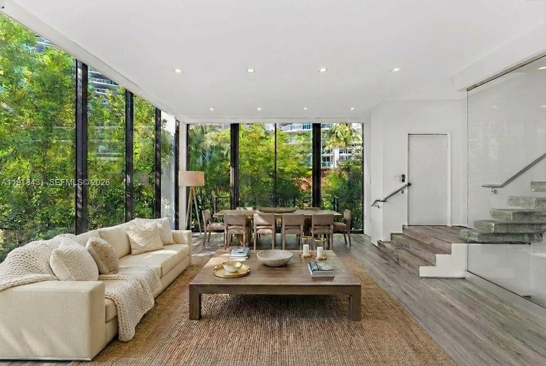 Beautifully designed and built in 2018, this modern townhouse offers three levels of luxury living in the heart of South Beach.