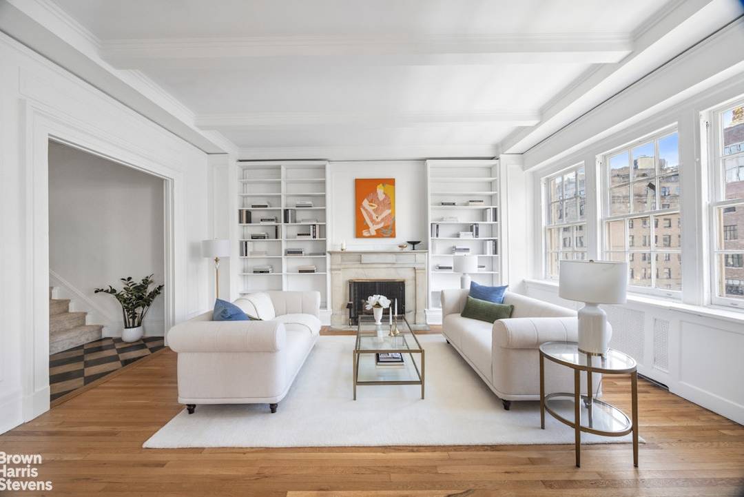High above Park Avenue, featuring soaring ceilings, views of the tree lined avenue and the iconic Carlyle Hotel through expansive living room windows, and offering three bedrooms flex four, a ...