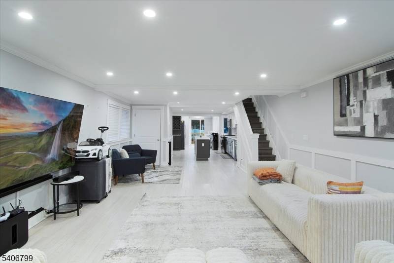 Experience refined living in this meticulously renovated 5 bedroom, 3.