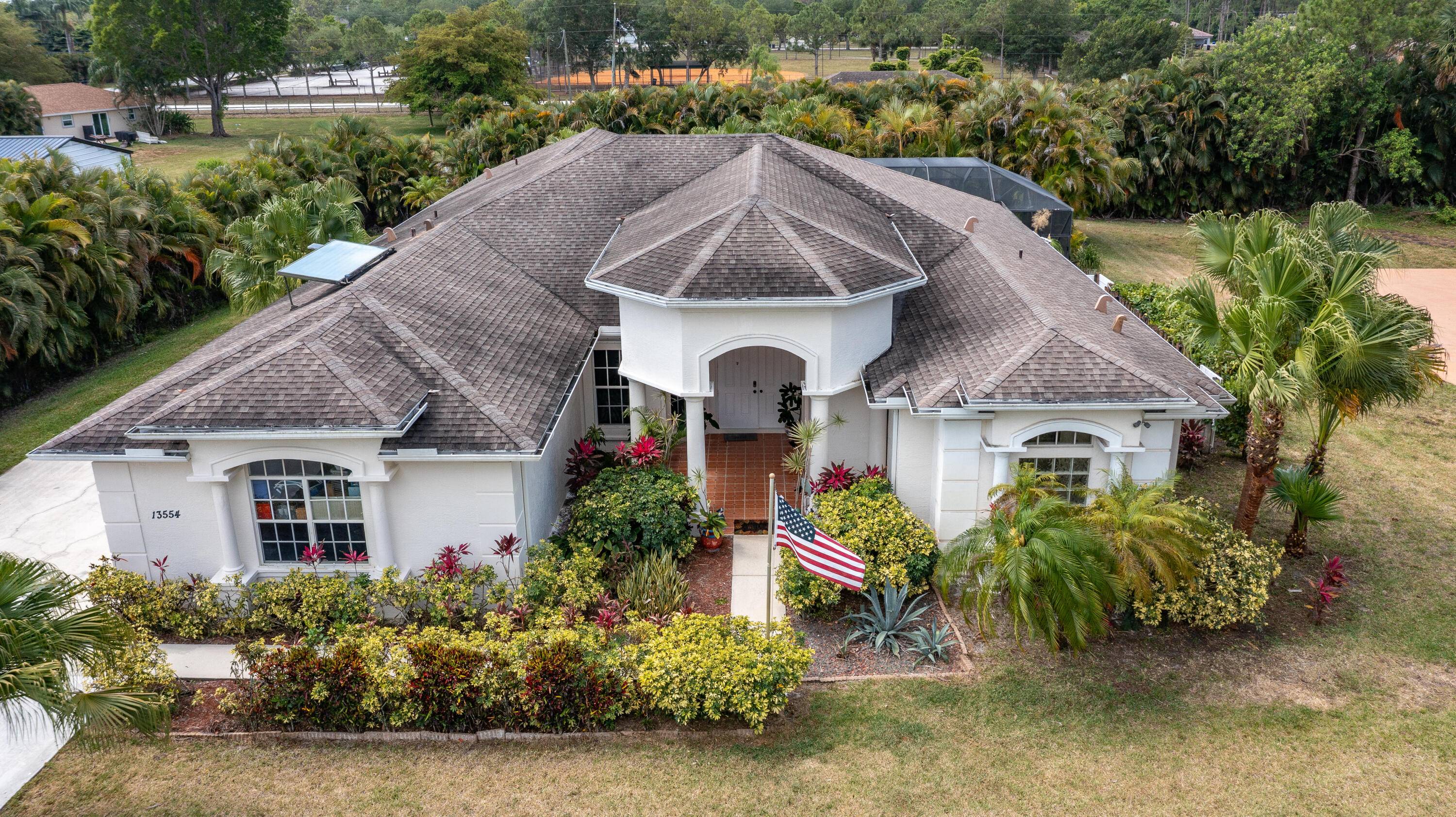 Fall in love with this beautiful custom home consisting of a primary residence attached in law quarter.