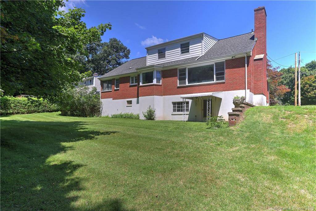Deceptively large expanded custom brick Cape available on a cul de sac in lower Trumbull close to shopping and highway access.