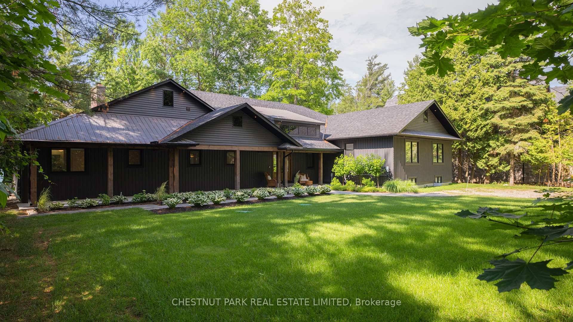 Luxury waterfront bungalow on Kempenfelt Bay with approximately 125 Feet of shoreline !