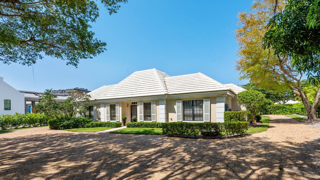 Discover timeless design and coastal living in this beautifully crafted residence by Richard Kimbrough, located in the exclusive community of Lost Tree Village.