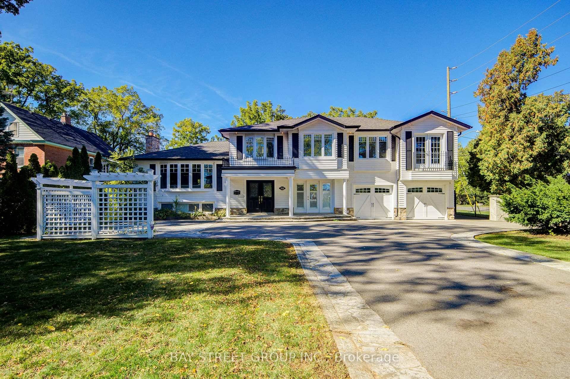 Nestled steps from Lake Ontario, this meticulously updated 2 storey executive home blends timeless charm with modern luxury.