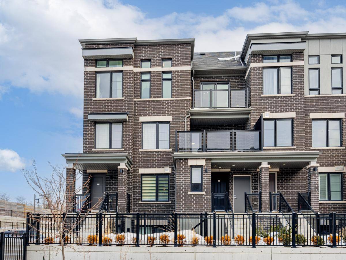 Experience the beauty of lakeside living in this stunning end unit stacked townhome, nestled in a growing community.