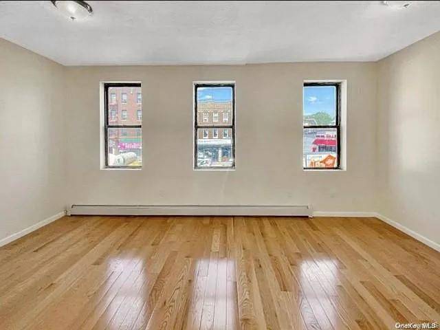 Beautifully renovated three bedroom, one full bath apartment with a spacious living room and separate dining room.