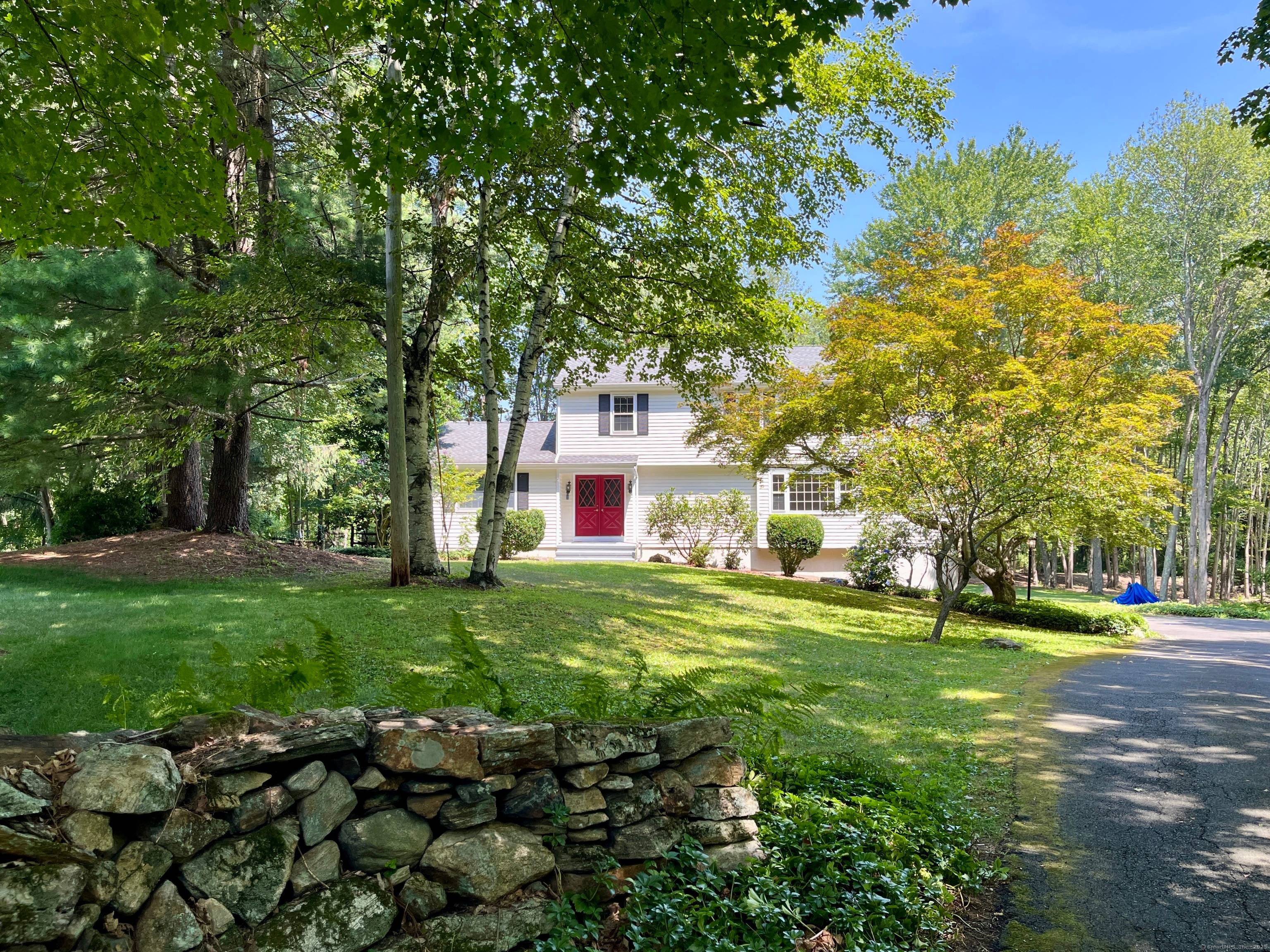 You'll enjoy living at the end of a quiet cul de sac in the coveted Tashua neighborhood.
